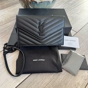 Saint Laurent Black Quilted wallet on Chain.